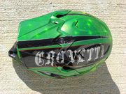 Green dirtbike helmet with stars and old school flames