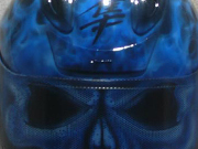 True fire blue skull full face motorcycle helmet with spine and brain exposed as well as airbushed visor.