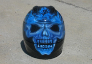 True fire blue skull full face motorcycle helmet with spine and brain exposed as well as airbushed visor.